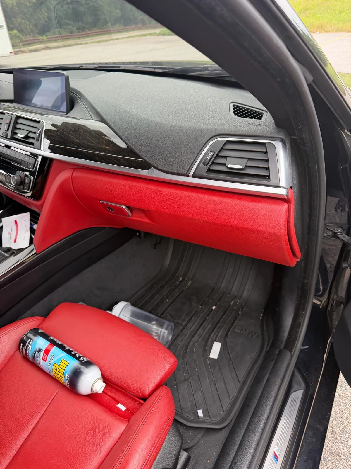 Front passenger area of a 2019 BMW 430i Gran Coupe after dash camera installation in Glen Burnie