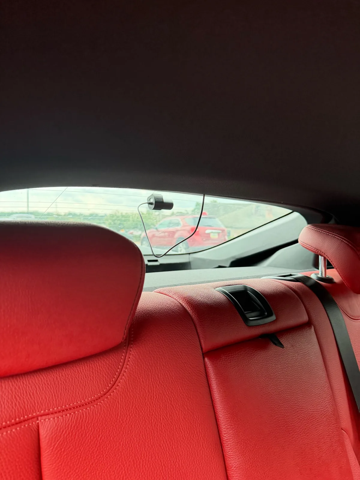 Rear-window dash camera mounted inside a 2019 BMW 430i Gran Coupe during a completed Glen Burnie installation