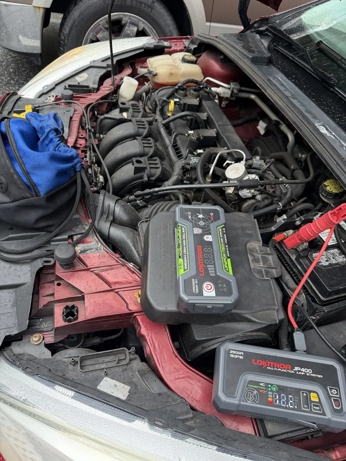 Mobile battery service for a Ford Focus in Owings Mills after rain