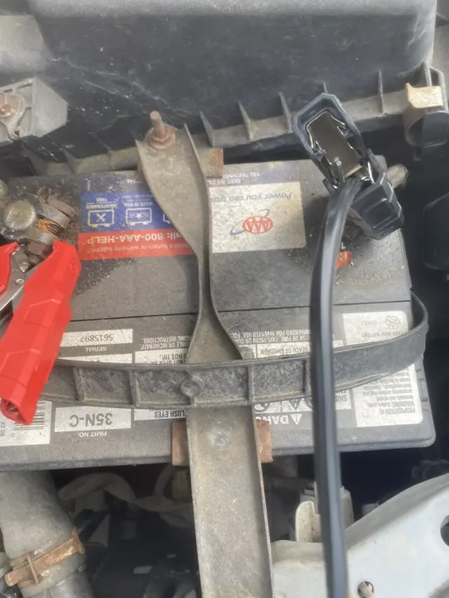Battery test cable connected in a Toyota Camry during Auto Tools Mart mobile service in Laurel Maryland